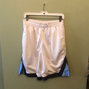 Tek Gear Men’s athletic shorts. Small stain.